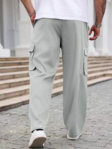 Manfinity Homme Pantalones casuales holgados de pierna ancha con bolsillos cargo para hombres de talla grande - Gris - Ver 2