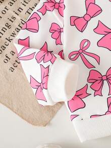 SHEIN Bộ đồ 2 món cho bé gái, gồm áo nỉ in nơ màu hồng, kiểu dáng rộng rãi thoải mái và quần dài, thời trang và đa năng. - Hồng - Xem 4