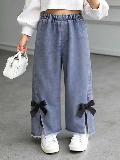女孩休闲时尚可爱蝴蝶结装饰宽松直筒松紧腰真牛仔水洗牛仔裤，百搭牛仔裤，适合秋冬，时尚单品