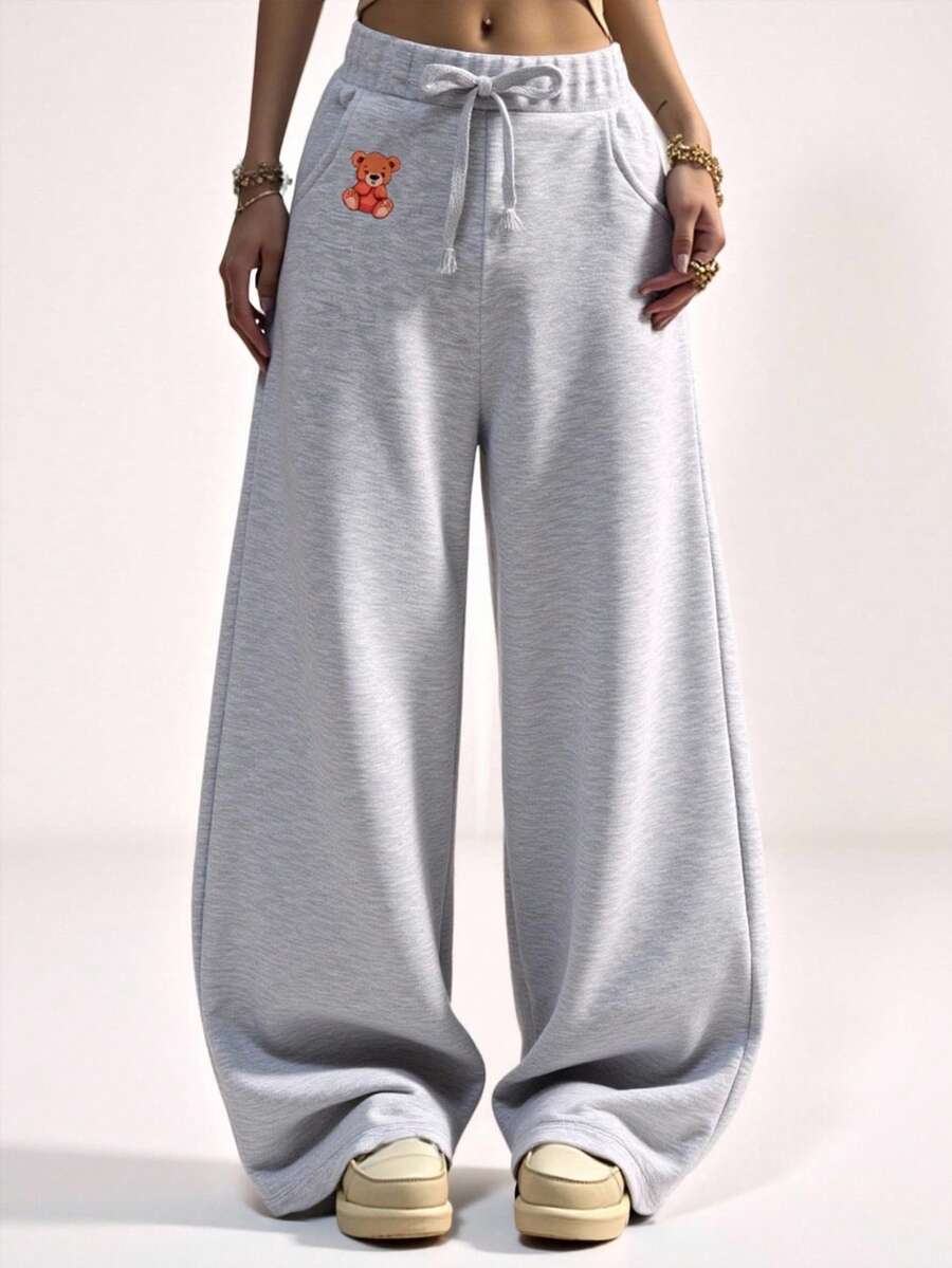 SHEIN Sparklyn Dziewczęce (dorosłe nastolatki) spodnie dresowe, minimalistyczny wzór z logo, kontrastowe kolory, ozdobna kieszeń, dzianinowe spodnie dresowe z kapturem, luźne, szerokie nogawki, długie - Szary - Zobacz 1