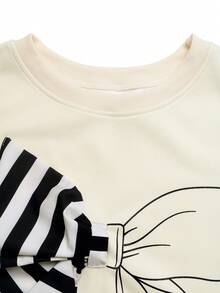 GlowEve بلوزة رياضية نسائية بياقة طاقم وأكمام طويلة مع فيونكة بلون متباين - بيج - مشاهدة 3