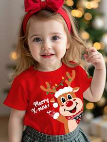 SHEIN Blusa de manga corta y cuello redondo con estampado de renos de dibujos animados, roja y festiva, ideal para niña en Navidad. Colección navideña nueva, adecuada para capas en verano.