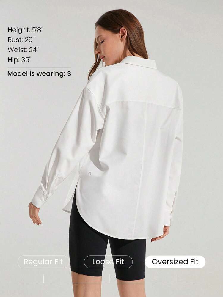 Chemise boutonnée surdimensionnée à manches fendues et poche de poitrine, pour un port casual quotidien en studio
