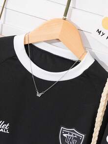 SHEIN Áo thun dài tay dáng rộng kiểu Mỹ dành cho bé gái tuổi teen, chất liệu mềm mại thoải mái, phù hợp cho thể thao, mặc thường ngày, đi học, chụp ảnh, du lịch và nhiều dịp khác, nhẹ nhàng, là món đồ không thể thiếu cho các bé gái tuổi teen sành điệu. - màu đen - Xem 4