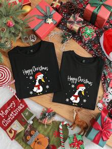 SHEIN EZwear Camiseta de pareja minimalista casual de Navidad, camiseta de mujer de manga corta y cuello redondo con estampado de lema navideño de corte holgado, adecuada para vacaciones - Negro - Ver 1