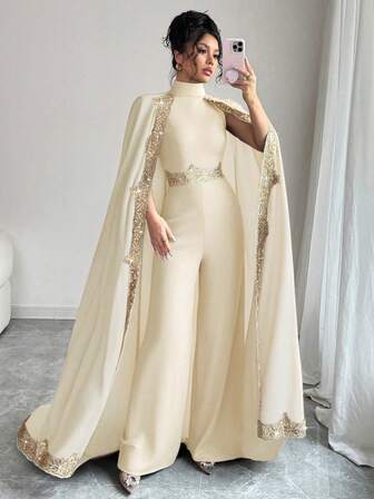 Rafferiza Elegant jumpsuit med dekal, lapptäcksmönstrad krage, vida ben