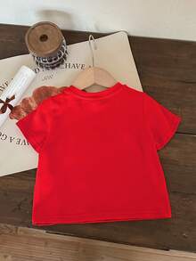 SHEIN Blusa de manga corta y cuello redondo con estampado de renos de dibujos animados, roja y festiva, ideal para niña en Navidad. Colección navideña nueva, adecuada para capas en verano.