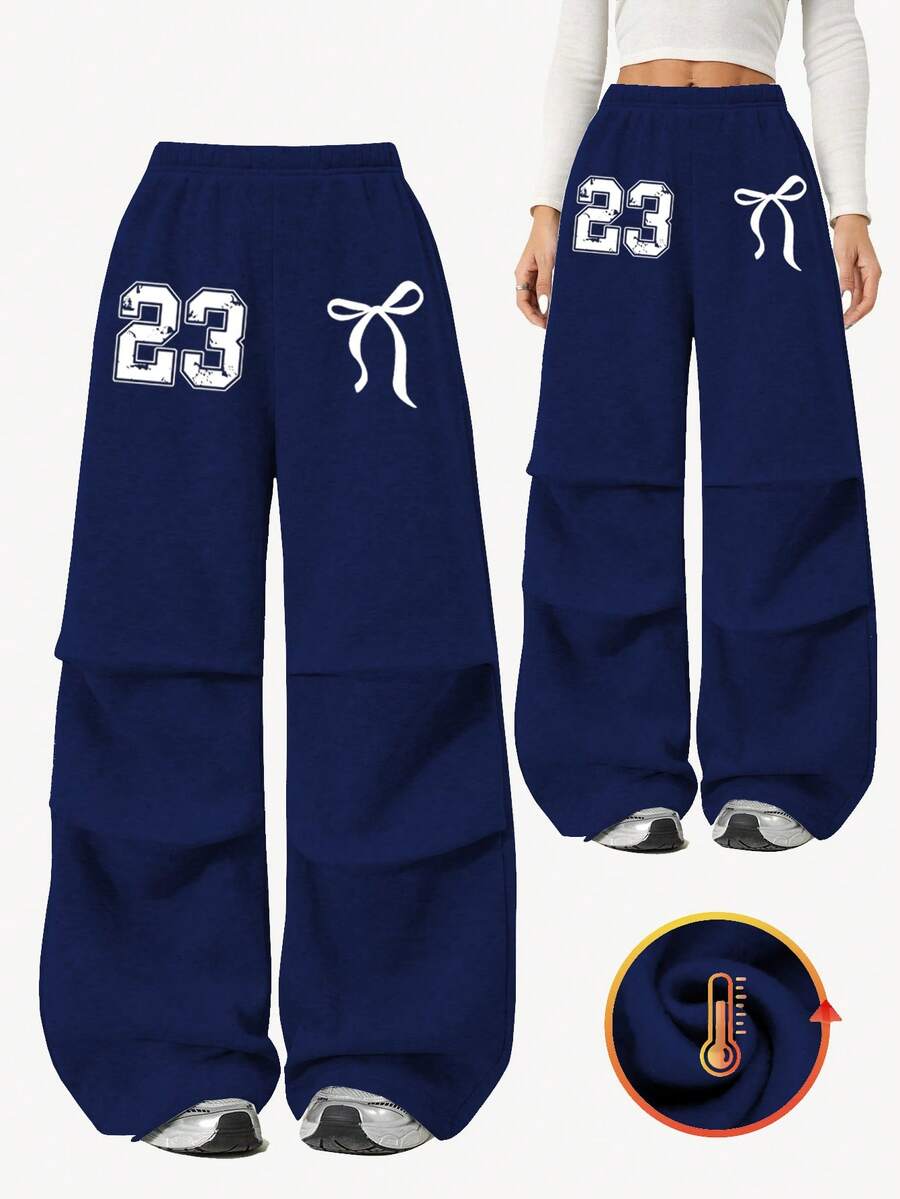 Dziewczęce, luźne, plisowane spodnie dresowe z kokardką i nadrukiem numerów, idealne do szkolnego mundurka jesienią i zimą - Granatowy - Zobacz 1