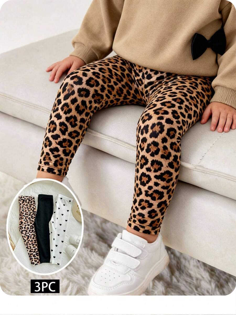 SHEIN Set casual da 3 pezzi per bambina, in maglia, con motivi a pois, leopardati e fiocchi, pantaloni elasticizzati, set versatile adatto per interni ed esterni, stile semplice, adatto per uso quotidiano, sport, feste, foto, vacanze, festival - Multicolore - Visualizzare 1