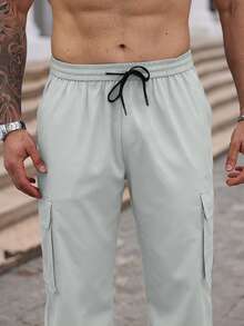 Manfinity Homme Pantalones casuales holgados de pierna ancha con bolsillos cargo para hombres de talla grande - Gris - Ver 3
