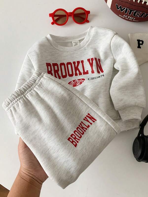 SHEIN 2 pezzi/set Tuta casual per neonato/bambina, felpa a maniche lunghe con stampa di lettere grigia e pantaloni jogger, abbigliamento unisex per neonati, abbigliamento invernale per bambini