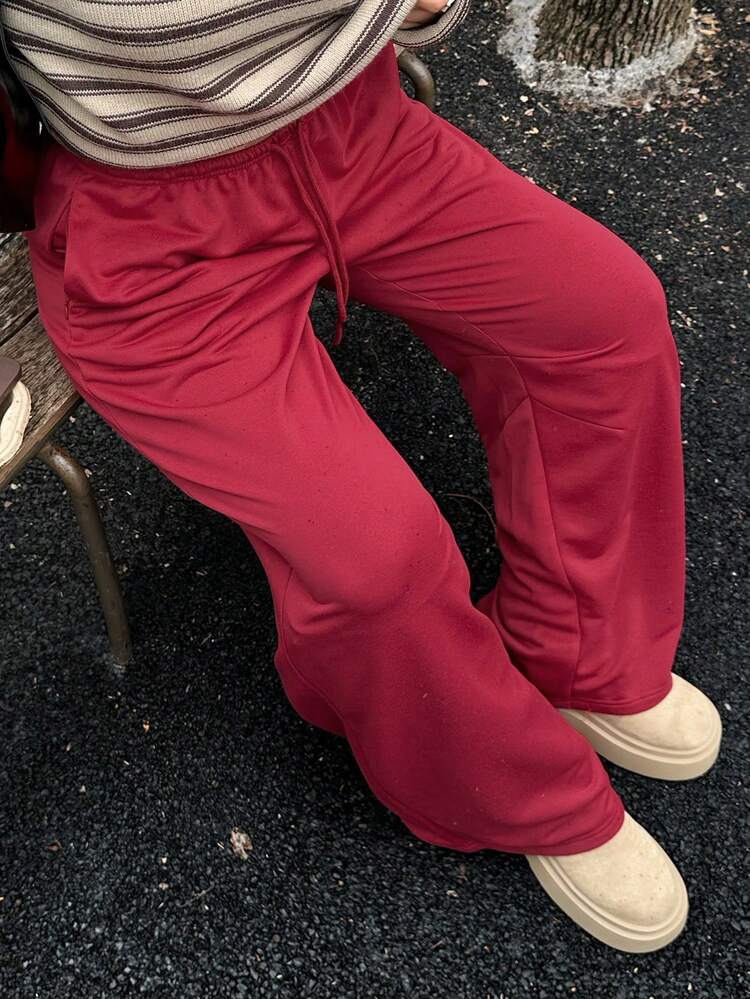 Dazy Plus Plus Size Women's Casual Pants With Elastic Waist, Drawstring, Side Pockets, Zipper Design, Loose Fit, Solid Red, Suitable For Christmas & New Year