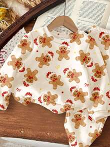 SHEIN Blanco crema, estampado de hombrecillo de jengibre de Navidad lindo y de dibujos animados, conjunto de sudadera con capucha y pantalones holgados, de ajuste casual para niña, de cuello redondo, cómodo, grueso, suave y cálido, adecuado para uso diario en otoño/invierno, hogar, Navidad, Año Nuevo, vacaciones