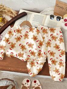 SHEIN Blanco crema, estampado de hombrecillo de jengibre de Navidad lindo y de dibujos animados, conjunto de sudadera con capucha y pantalones holgados, de ajuste casual para niña, de cuello redondo, cómodo, grueso, suave y cálido, adecuado para uso diario en otoño/invierno, hogar, Navidad, Año Nuevo, vacaciones