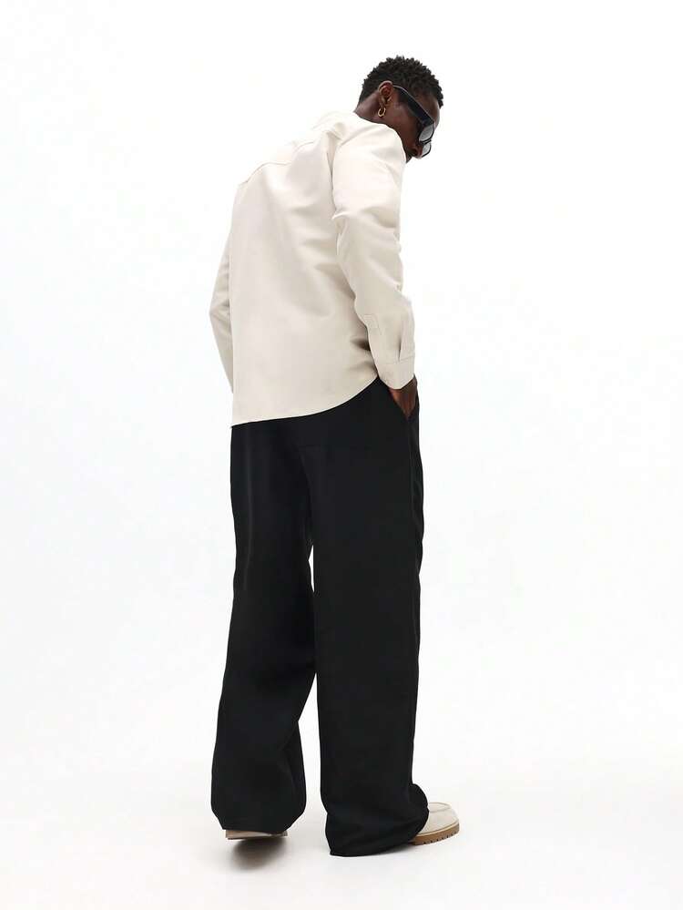 Koszula kremowa z czarnymi spodniami w komplecie