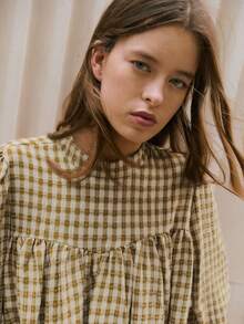 Nöista 格子衬衫，优雅高领，蓬松袖子，宽松廓形，为女性冬季提供别致精致的选择，非常适合打造精致的日常造型、优雅的派对装扮、节日圣诞装扮和优雅的新年装束。 - 棕色 - 查看 4