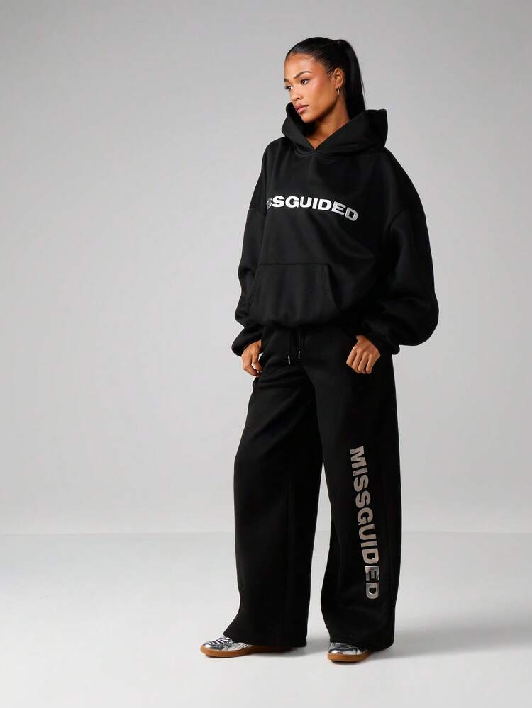 MISSGUIDED Calça Jogger de Perna Larga com Estampa de Texto Vertical, Cintura com Cordão, Roupa de Descanso Casual para Conforto