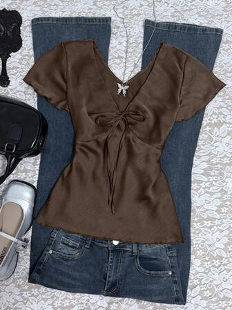 Rina Fox Blusa de mujer de unicolor con cuello en V y detalle de nudo en la parte delantera, de manga corta, elegante para el verano