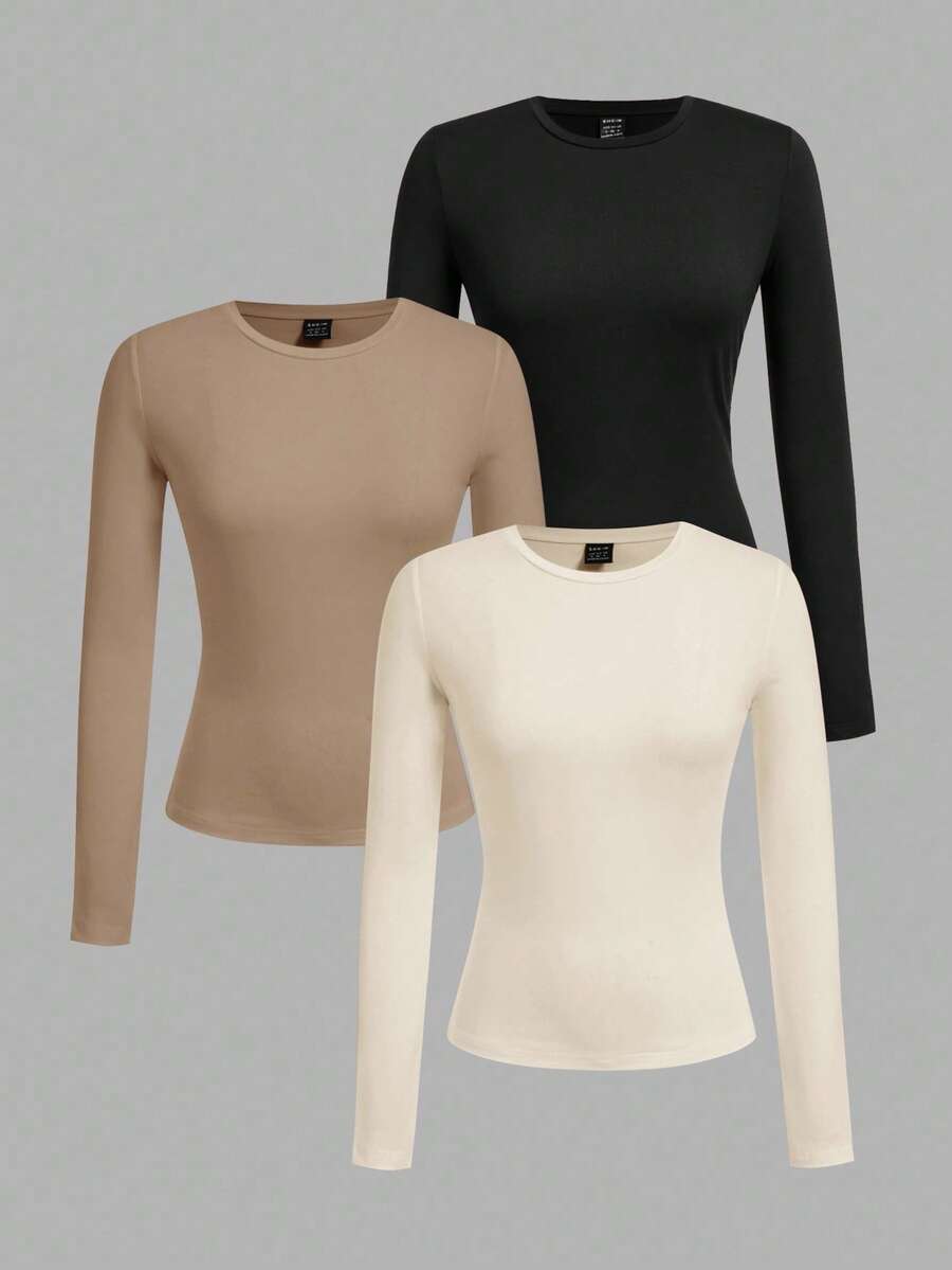 SHEIN EZwear Set de 3 camisetas de manga larga de ajuste ceñido y cuello redondo para mujer de talla grande, de unicolor, aptas para otoño/invierno, para usar por capas, actividades al aire libre, como camiseta interior - Multicolor - Ver 1