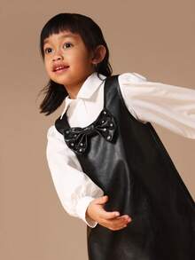 SUMWON Schwarzes Kunstleder-Pinafore-Kleid mit weißer Knopfleiste für Mädchen Schuluniform Herbst Winter