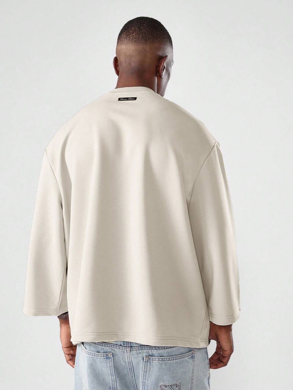 Camiseta extragrande de corte cuadrado con mangas largas y anchas