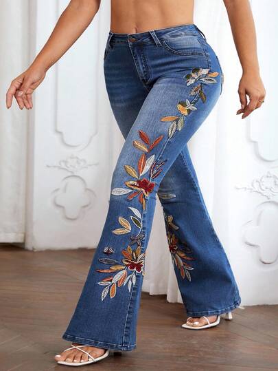 Slaydiva Jeans acampanados de talla grande con lavado y bordado floral casual