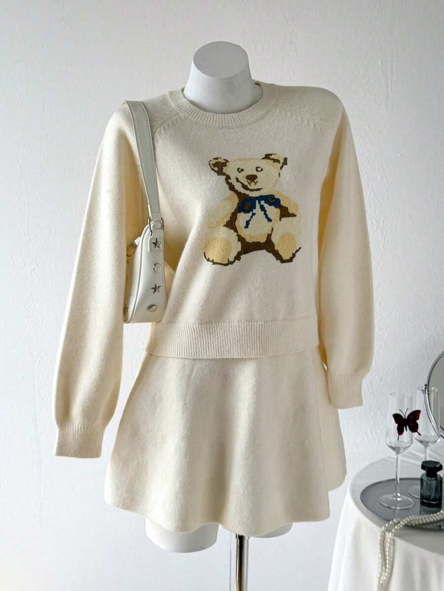 SHEIN Lässiger, lockerer Strickpullover mit Rundhalsausschnitt und langen Ärmeln für Damen, Neuheit Herbst/Winter, niedlicher Bären-Jacquard-Pullover + vielseitiger Faltenrock, Party-Set für Frühling und Herbst, Langarm-Top für Teenager-Mädchen, Pullover-Sets, Langarm-Top-Set für Teenager, Rock-Set für Teenager, weiße Mädchenkleidung, Mädchen-Strickset, Schulkleidung für Teenager, Mädchen-Cardigan für Kleider, Mädchen-Uniformkleid, Herbstoutfits für Mädchen - Beige - Übersicht 1