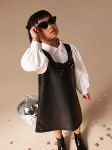 SUMWON Schwarzes Kunstleder-Pinafore-Kleid mit weißer Knopfleiste für Mädchen Schuluniform Herbst Winter