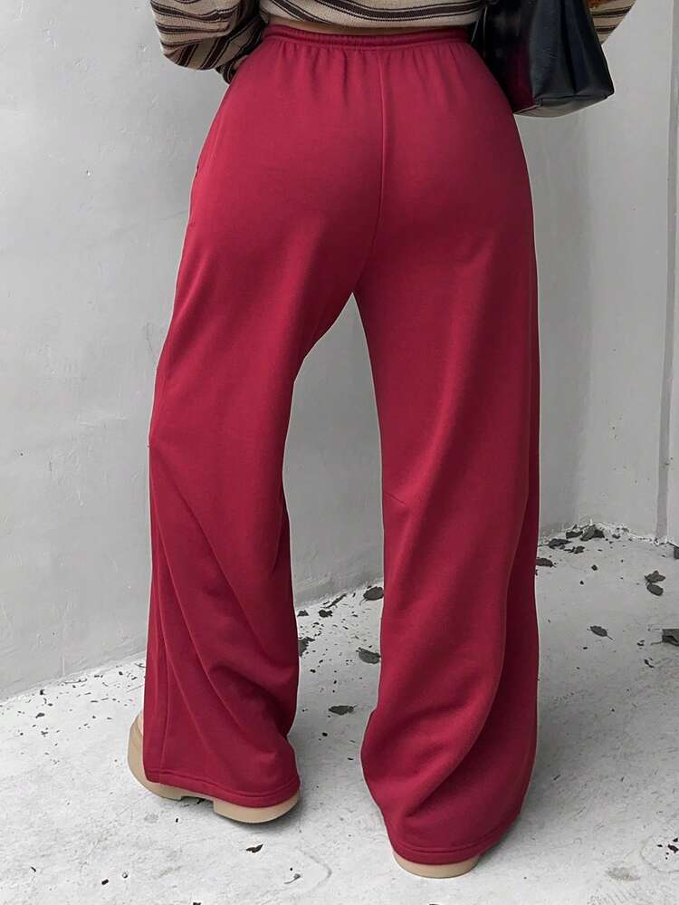 Dazy Plus Plus Size Women's Casual Pants With Elastic Waist, Drawstring, Side Pockets, Zipper Design, Loose Fit, Solid Red, Suitable For Christmas & New Year