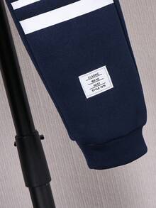 Conjunto de 2 piezas de sudadera con capucha y pantalones casuales para niños, gráfico de letras blanco y rayas blancas y azul marino, ajuste relajado, apto para uso diario, escuela, deportes, otoño/invierno, uniformes escolares, esenciales - Azul Marino - Ver 7