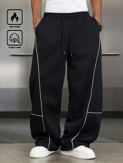 Manfinity EMRG Men's Loose Fit Casual Sweatpants,Baggy Pants,Track Pants,Jogging,Baggy,Streetwear Versatile Street Style For Young Men: Suitable For Streetwear, Casual Daily Wear, Weekend Outings, Music Festivals, Social Gatherings And More. This Pant Is An Essential Versatile Piece In A Man's Wardrobe, Making It A Great Gift For Boyfriends Or Husbands. Streetwear Sweatpants