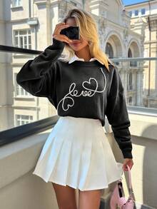 EURMUSE Suéter adorable de cuello redondo con bordado de patrón de corazón y formas de amor en color de contraste casual - Negro - Ver 6
