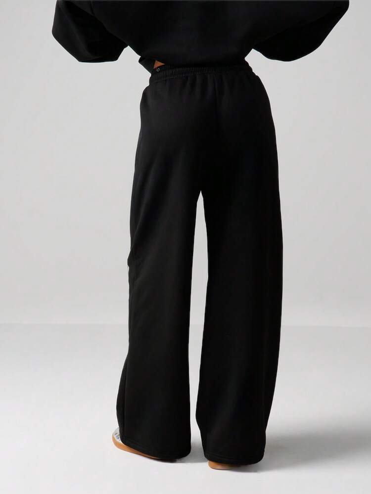 MISSGUIDED Calça Jogger de Perna Larga com Estampa de Texto Vertical, Cintura com Cordão, Roupa de Descanso Casual para Conforto