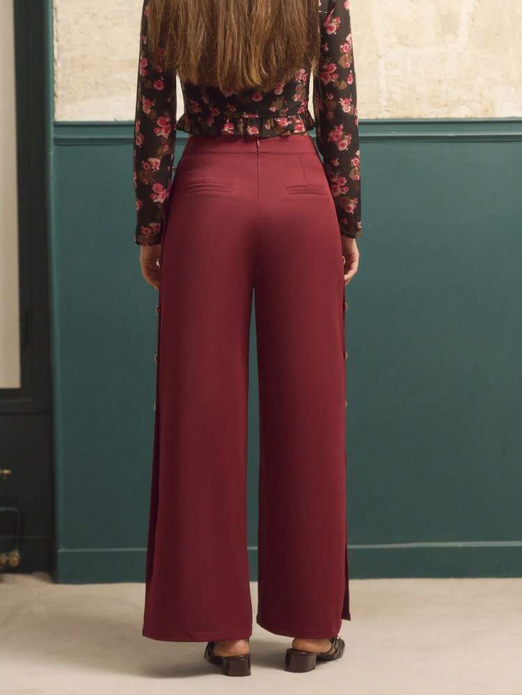 Pantaloni a vita alta a gamba ampia color borgogna con bottoni laterali dorati e spacchi regolabili, pantaloni eleganti casual da ufficio per l'autunno-inverno