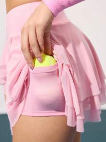 CourtClass Falda asimétrica con volantes de malla de cintura regular, con shorts y bolsillos, adecuada para uso diario casual, correr, yoga, gimnasio, tenis, golf y otros deportes, utilizable en todas las estaciones - Rosa - Ver 5