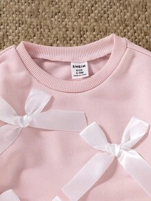 SHEIN 女婴幼儿新生儿 0-3 岁休闲日常搭配蝴蝶结装饰圆领长袖运动衫 + 罗纹针织裤套装，秋冬 - 粉色 - 查看 6