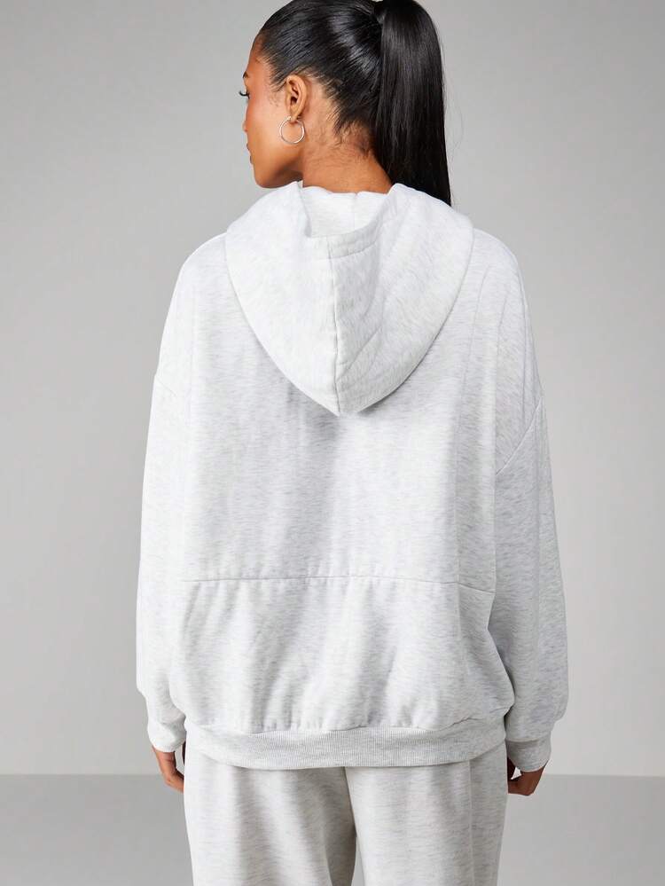 Missguided x Playboy Oversized Hooded Sweatshirt With Centre Pocket And Sports Club Graphic Print For Casual Comfort