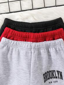 SHEIN 男童休闲校园风舒适时尚简约实用百搭长裤，饰有贴布和口袋，适合男童、返校季、日常穿着、旅行、运动、秋冬季慢跑裤、运动裤、嘻哈裤、新年等场合。 - 紅色 - 查看 4