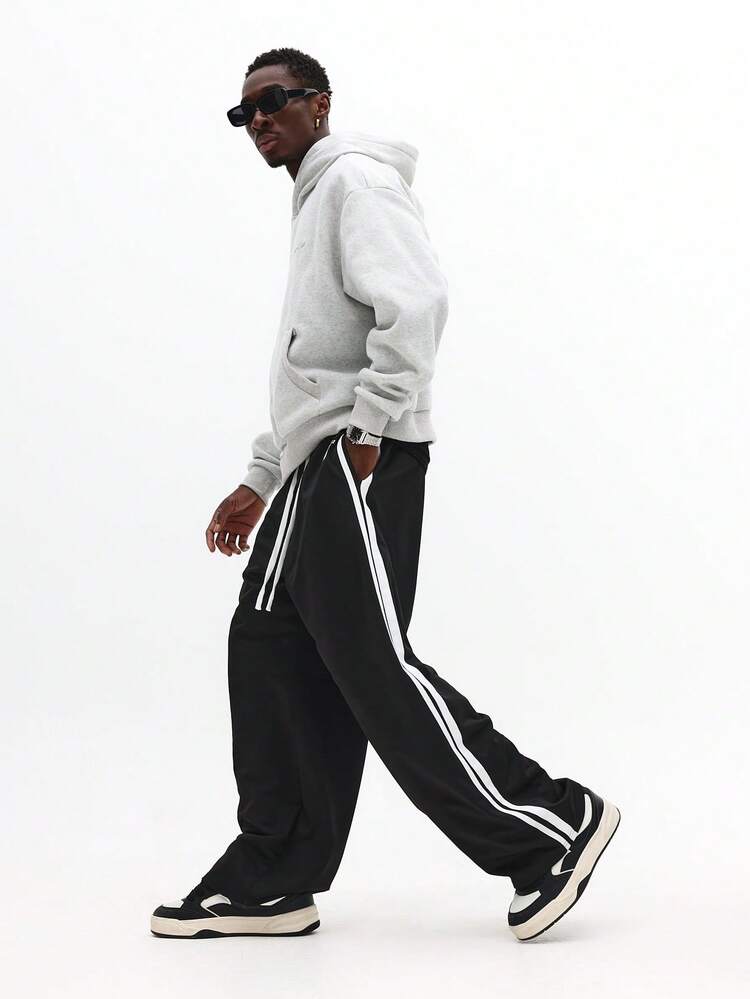 Loose Fit Sweatpants With Side Stripes And Logo
