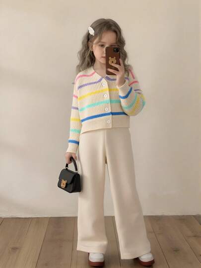 SHEIN Young Girl' V-Neck Rainbow Striped Cardigan Paired With Casual Straight Pants, Suitable For Home, Outings, Gatherings, Back To School Winter Christmas Halloween Toddler Cardigan Sweater Autumn Fall Jumpers Sweaters Tops Dress Dresses Christmas Jumper Cozy Pixies Prepcrw Christmas Outfit Halloween  New Born Toddler  Fall Winter Dress Halloween  Romper Stuff Halloween Jumper Jumper Cardigans Shirts White Cardigan Clean Downtown Off The Shoulder Sweater Outfit Sets Pink Sweater Jacket Cute Fall Outfits Outfits Top Maija Christmas Dress  Toddler Fall Dark Purple Skirt Christmas Sweater  Fall Sweaters Unisex White Sweater Vest Skirt Sets