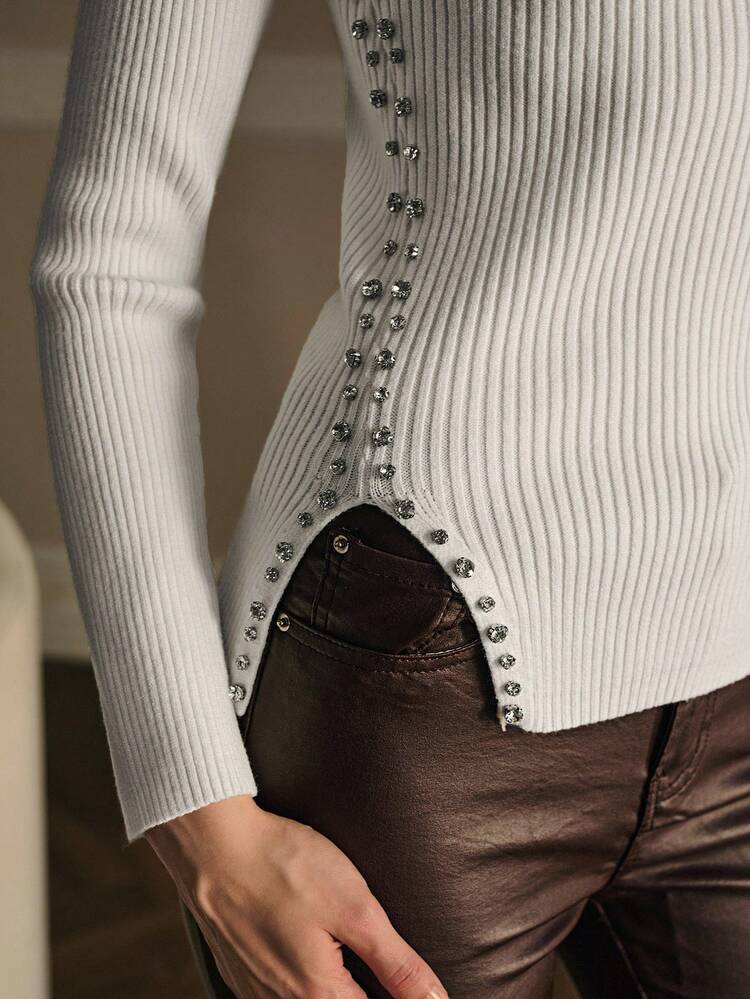 Maglione spezzato con strass