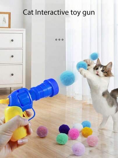 猫咪绒球发射器玩具，随机颜色猫咪绒球自嗨玩具。产品图片展示了使用方法，宠物互动绒球发射器玩具枪（消耗品），1个装。