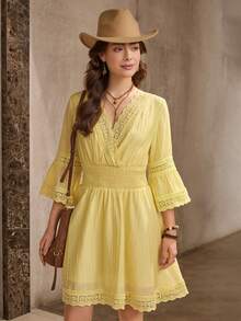Wildy 浪漫波西米亚假日奶油黄色荷叶边喇叭袖短裙，新品上市