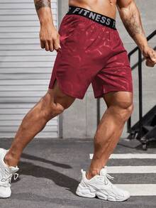 Manfinity Sport Corelite Shorts de sport pour hommes avec imprimé géométrique et bande de lettre