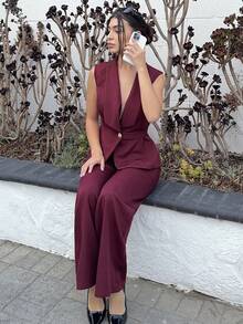 Andrea Bello Conjunto de oficina elegante para ir al trabajo y tomar el té de la tarde, compuesto por una chaqueta blazer sin mangas con cuello y bajo asimétrico, con decoración de hebilla metálica en la cintura, combinada con pantalones de cintura elástica, conjunto de 2 piezas, para primavera/verano