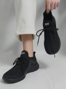 Tenis para hombre ligero tejido transpirable punta redonda con cordones suela gruesa negra estilo deportivo casual diario - Negro - Ver 1