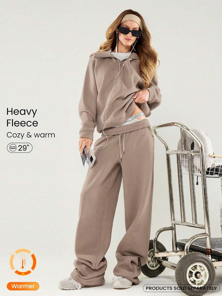 Pantalon de jogging ample en molleton épais avec taille ajustable à cordon de serrage, jambes larges, poches latérales, pour un usage quotidien et décontracté. Thermique et chaud pour l'hiver.