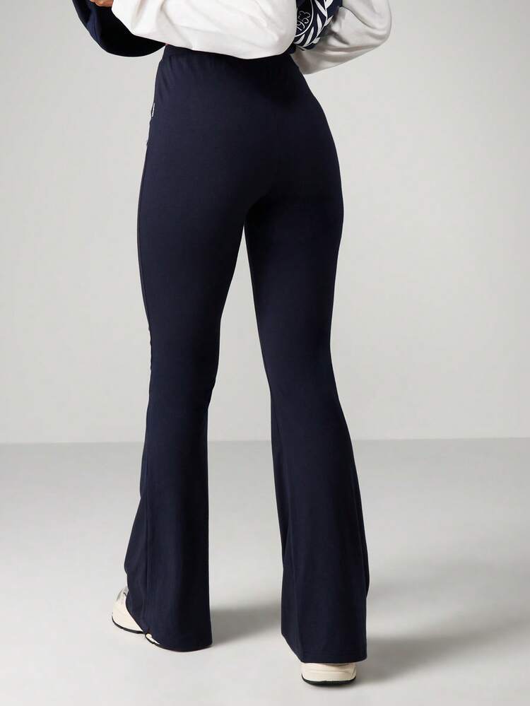Missguided x Playboy High Rise Flared Pants With Script Print Detail For Casual Chic Style