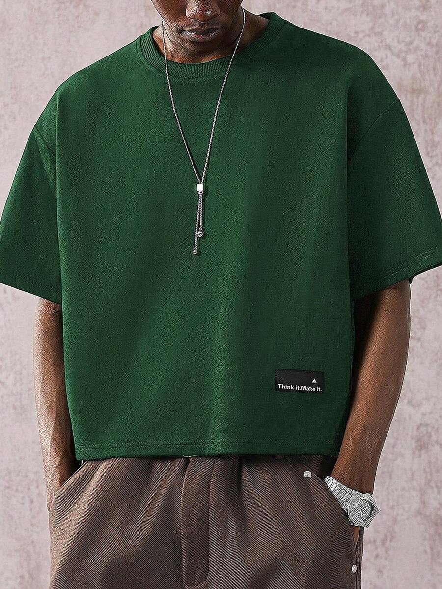 STYNVO Áo thun nam cổ tròn rộng rãi họa tiết chữ - Màu xanh lá cây đậm - Xem 1