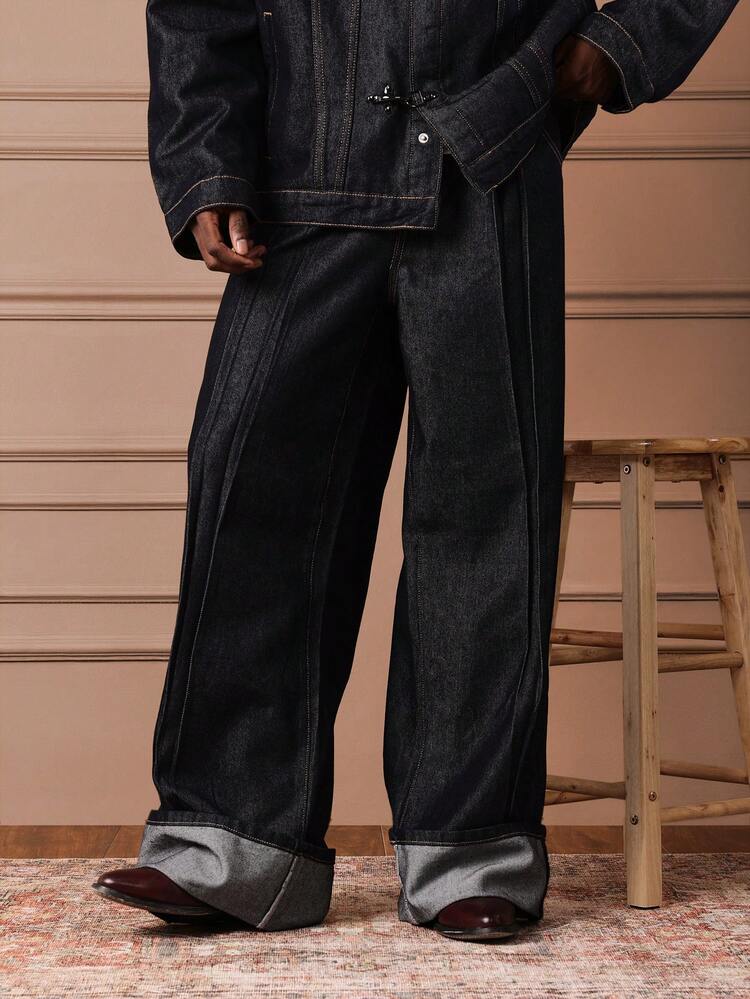 Jeans aus Raw Denim mit Bundfalten vorne